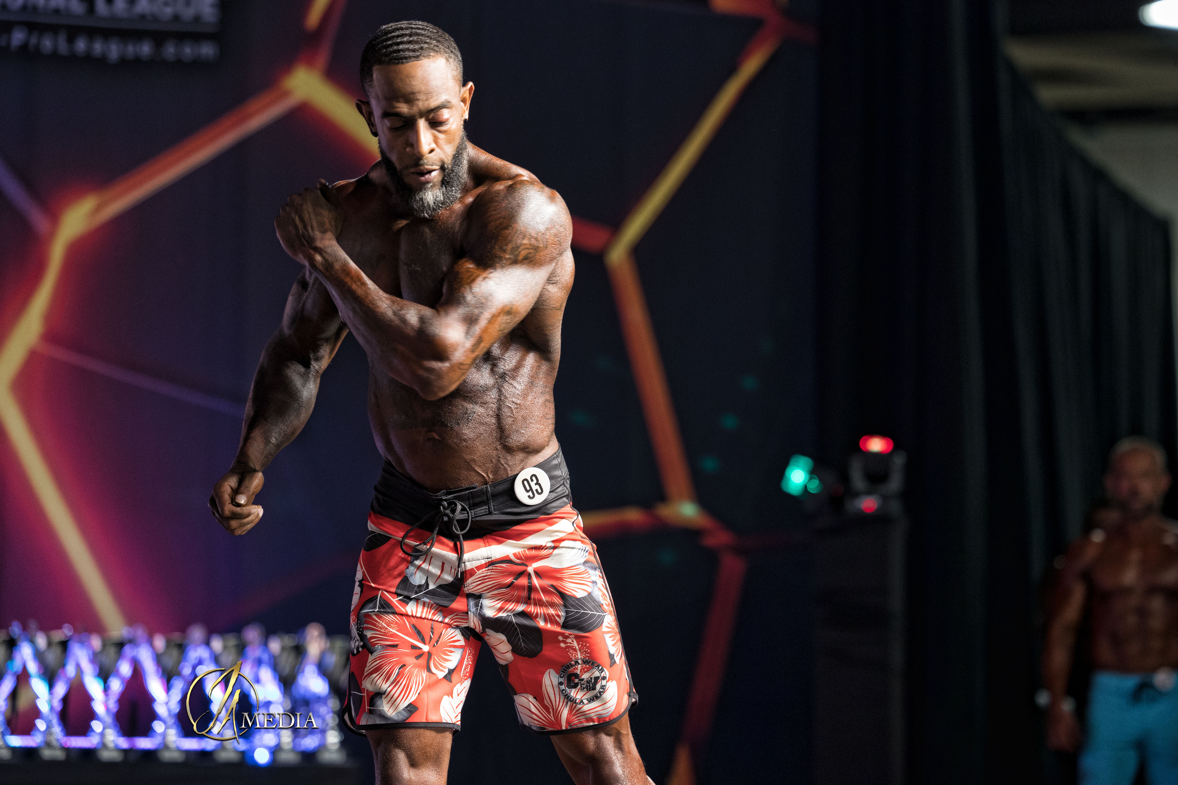 Abe Walzer on a physique competition stage — guest photograph supplied for this feature