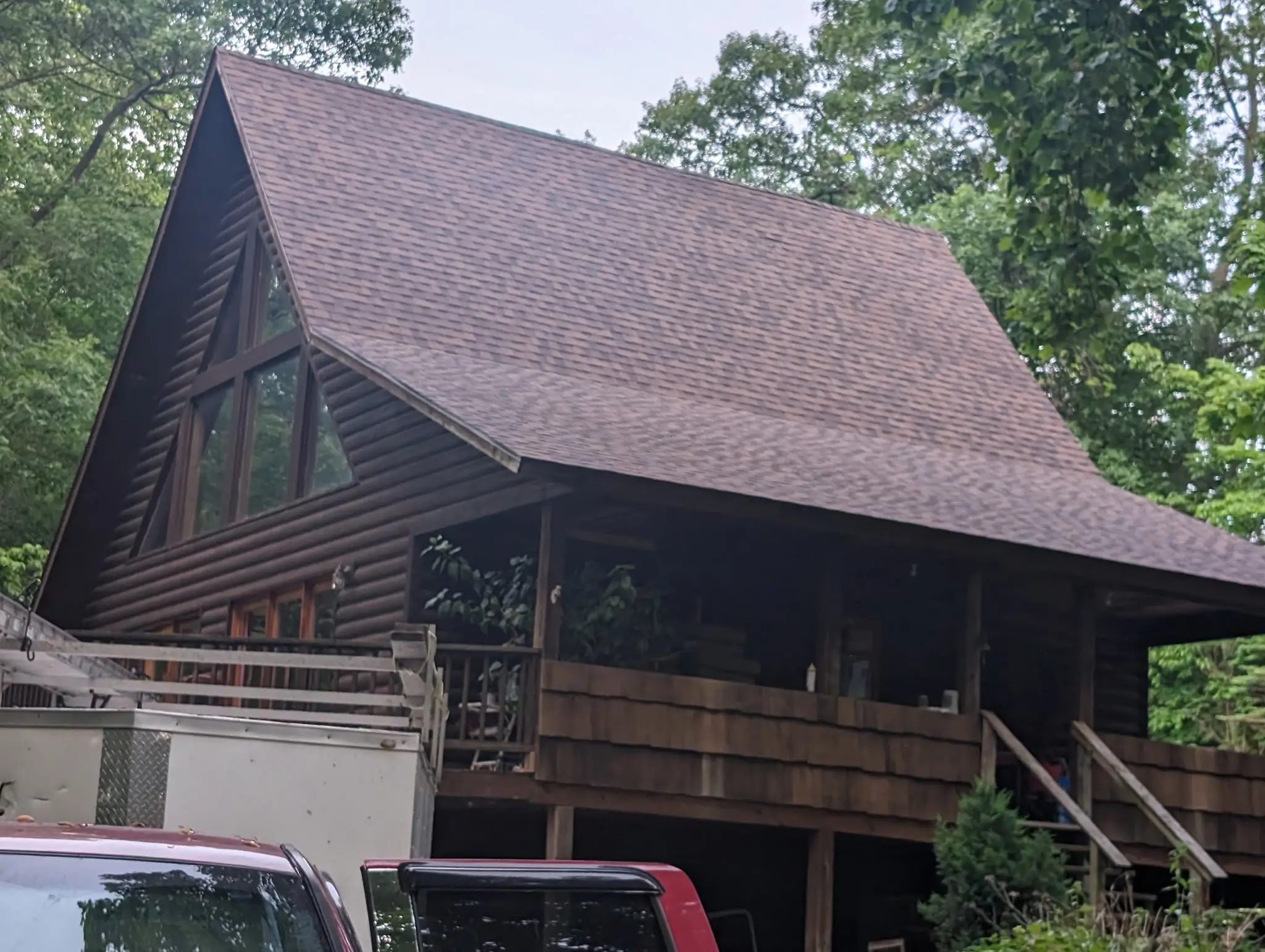Mueller Construction crew working on a residential roof installation