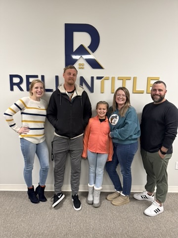 Clients at closing with Channing Moore
