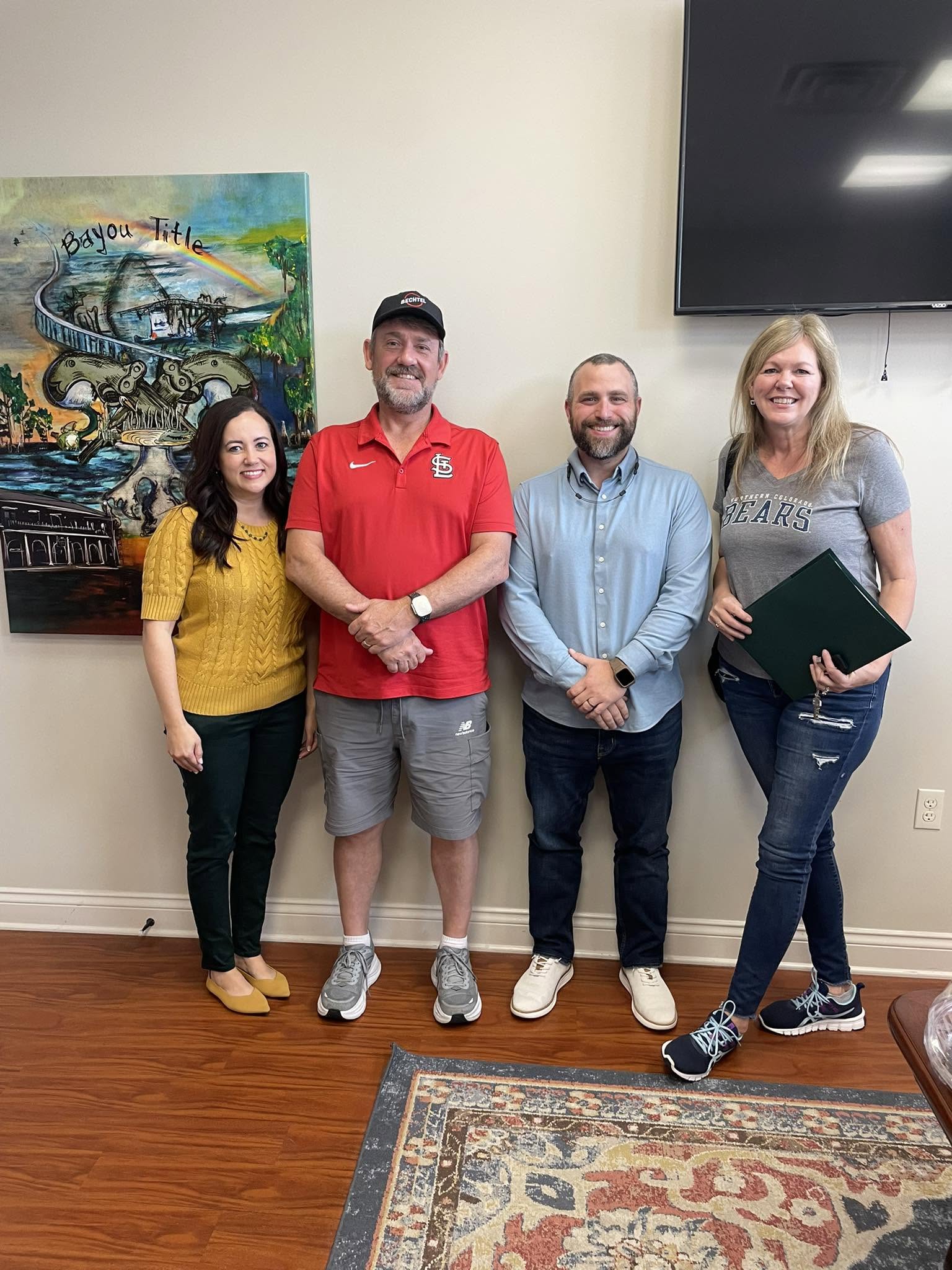 Clients at closing with Channing Moore