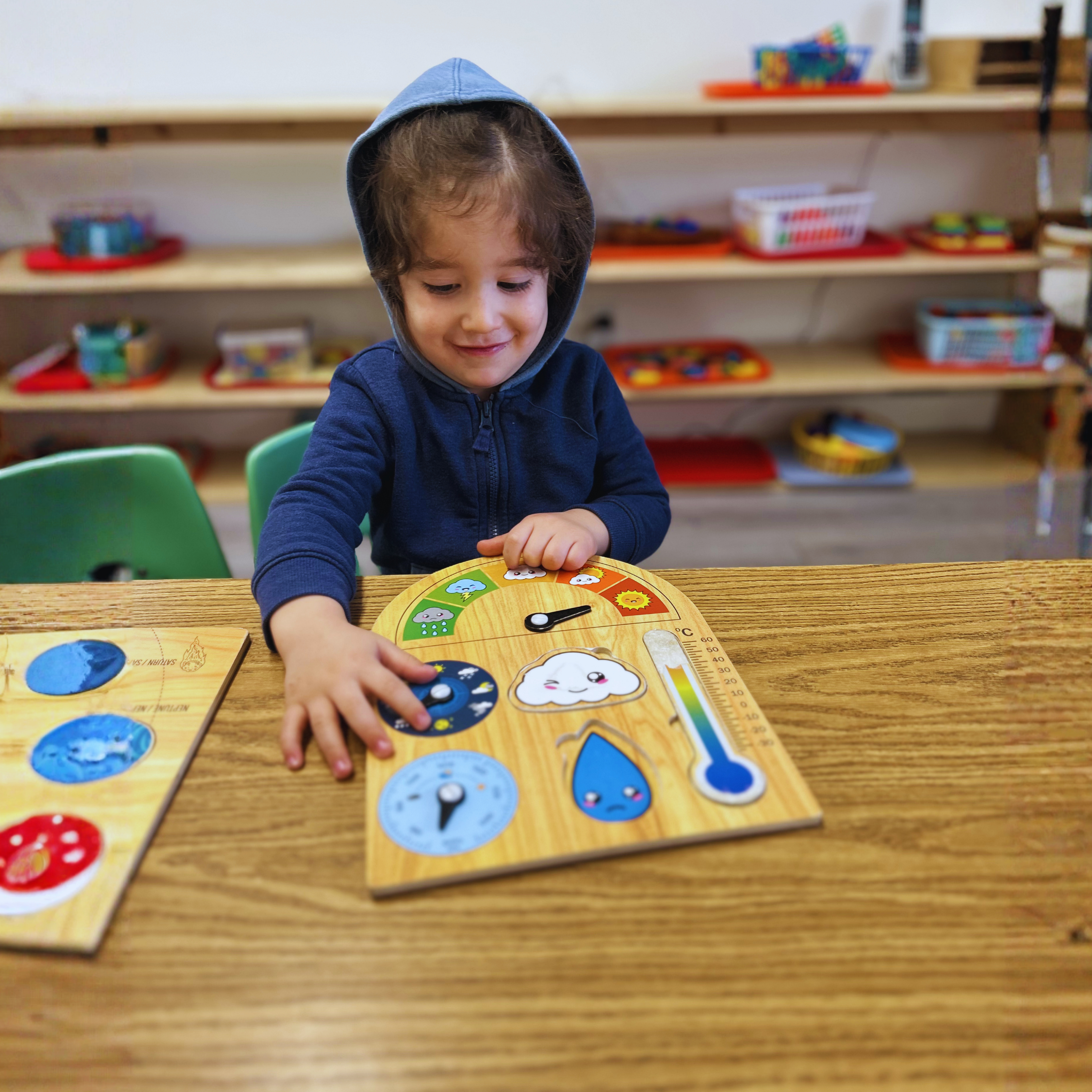 Child working with Montessori materials