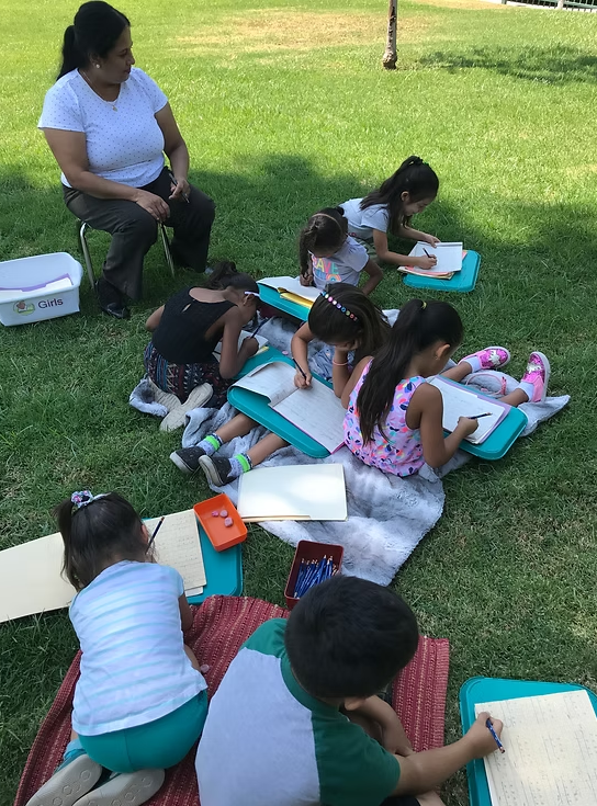 Children engaged in Montessori work