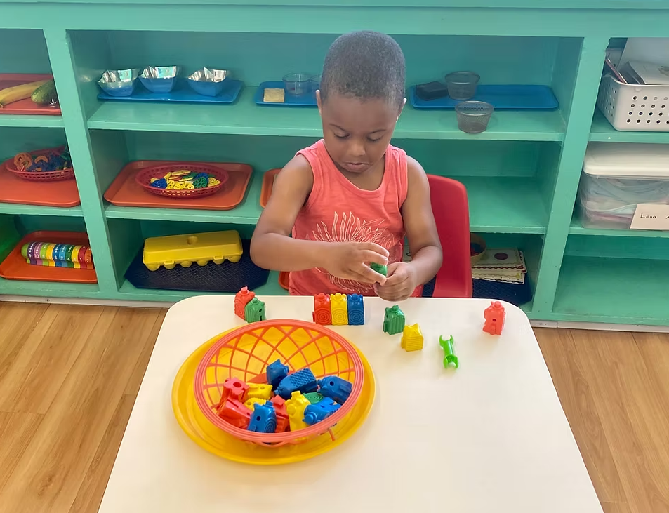 Children engaged in Montessori work