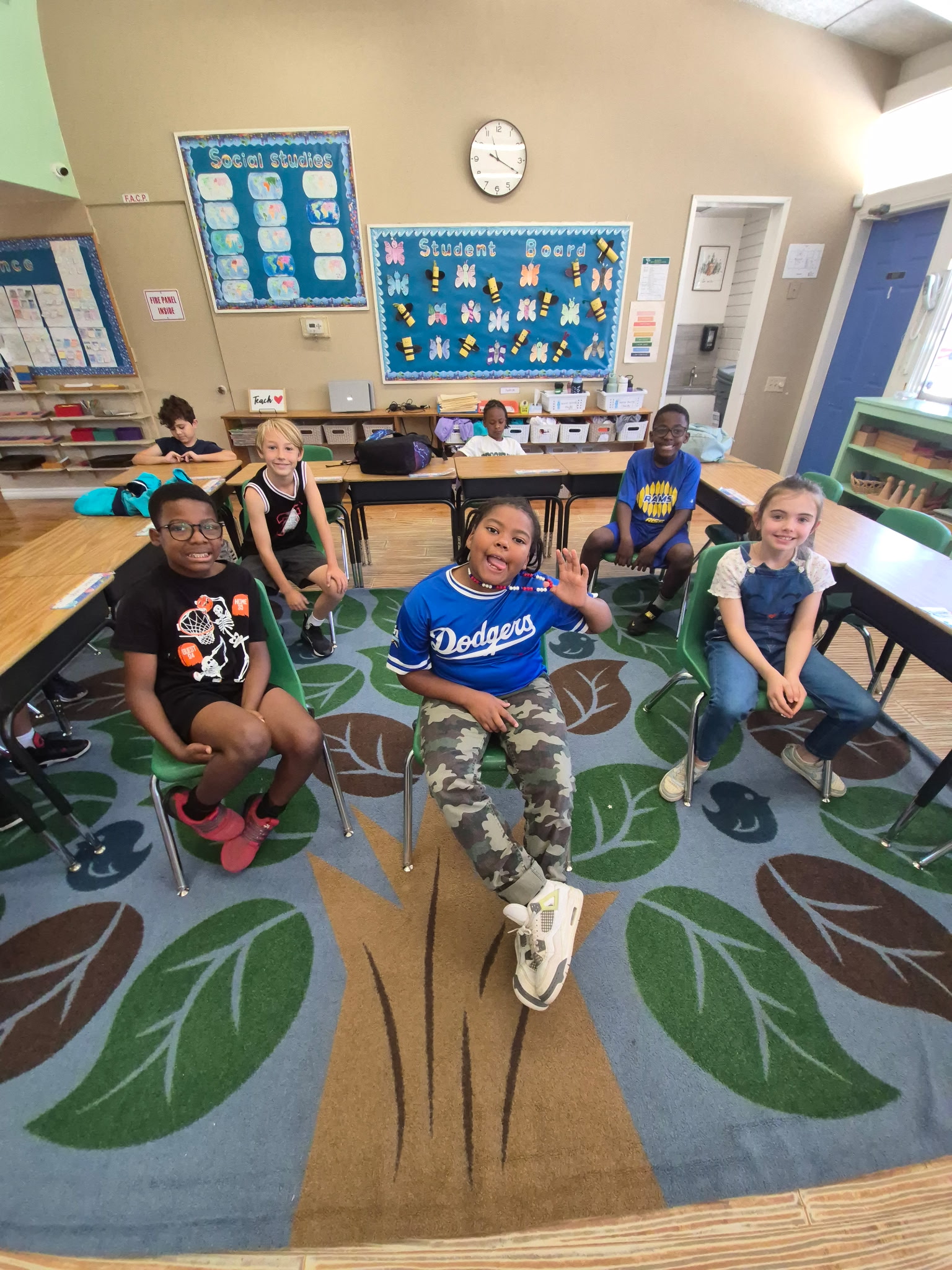 Elementary children working with a map