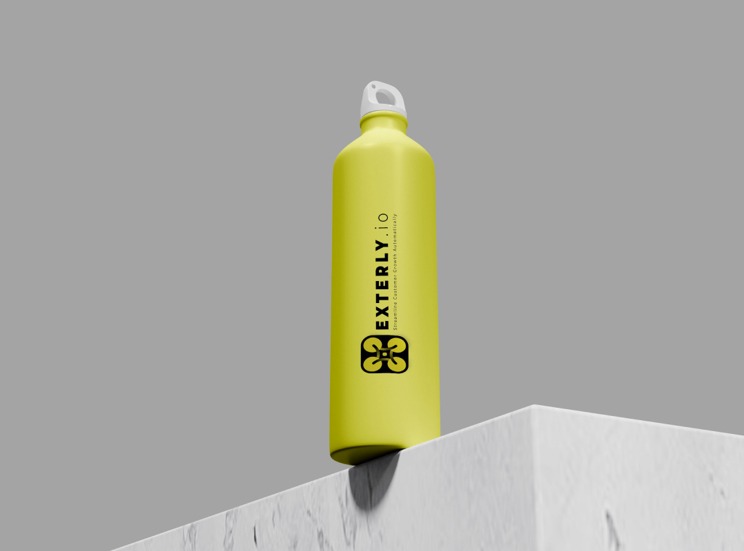 corporate stationary yellow water bottle with a logo of business automation software saas EXTERLY.IO logo