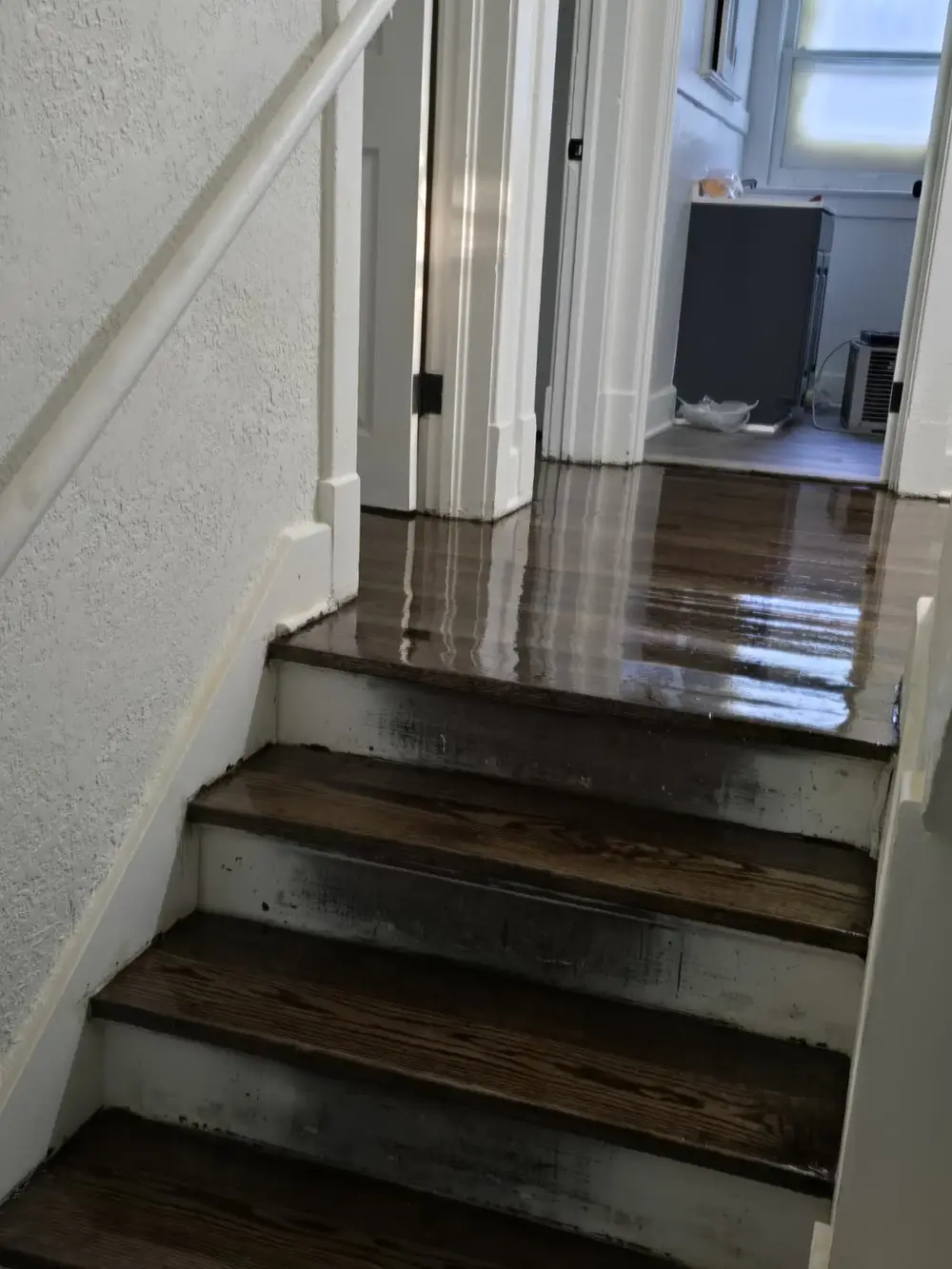 Staircase refinished with a dark stain
