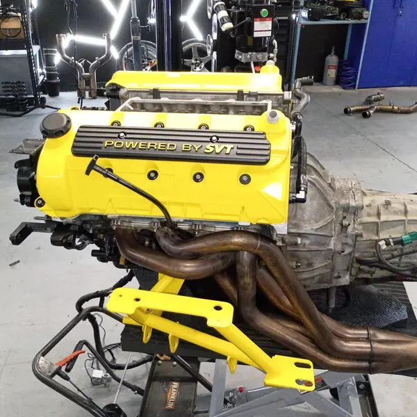 Yellow powder coated engine covers