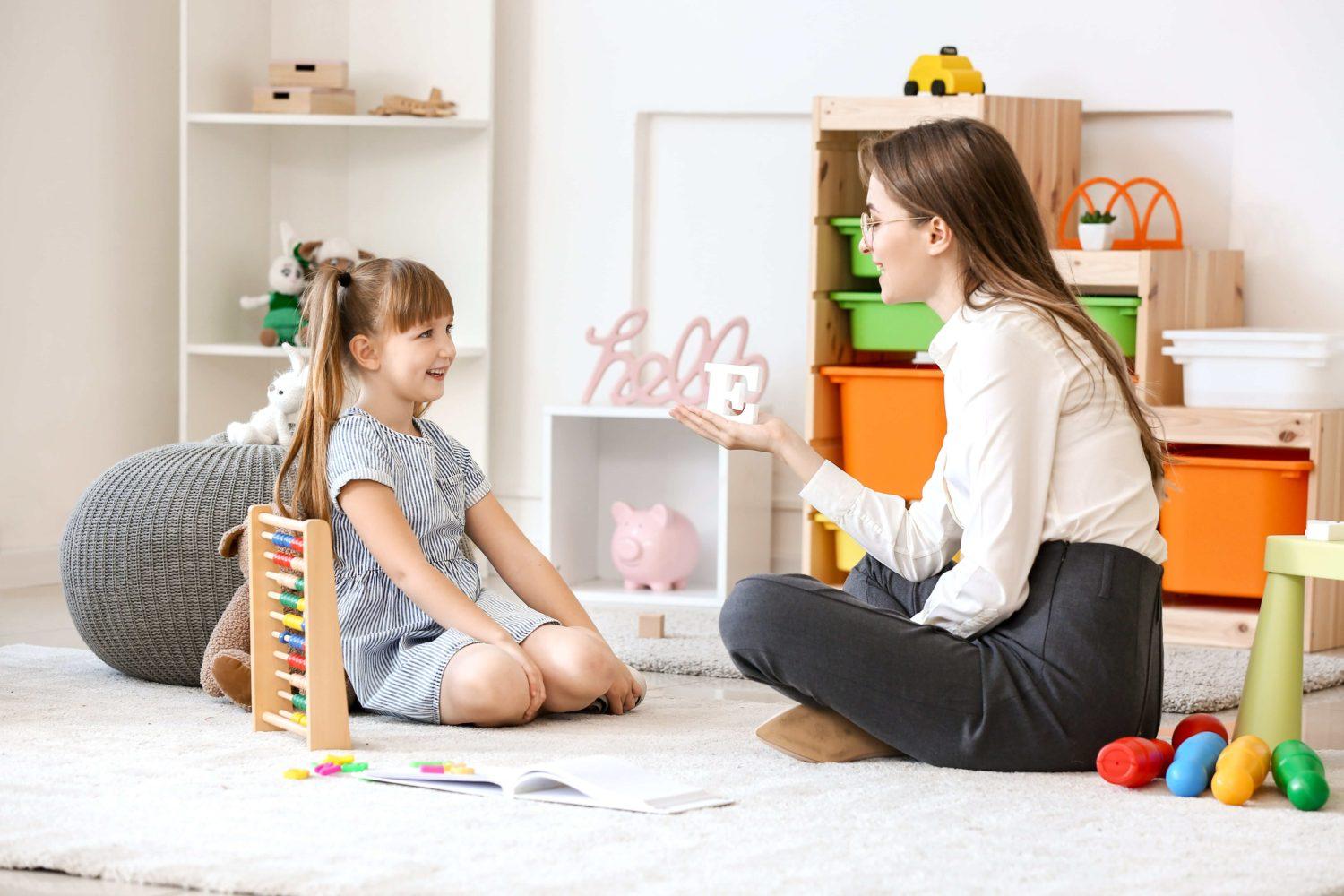 ABA therapist in one-on-one session with child with autism in Westminster CA