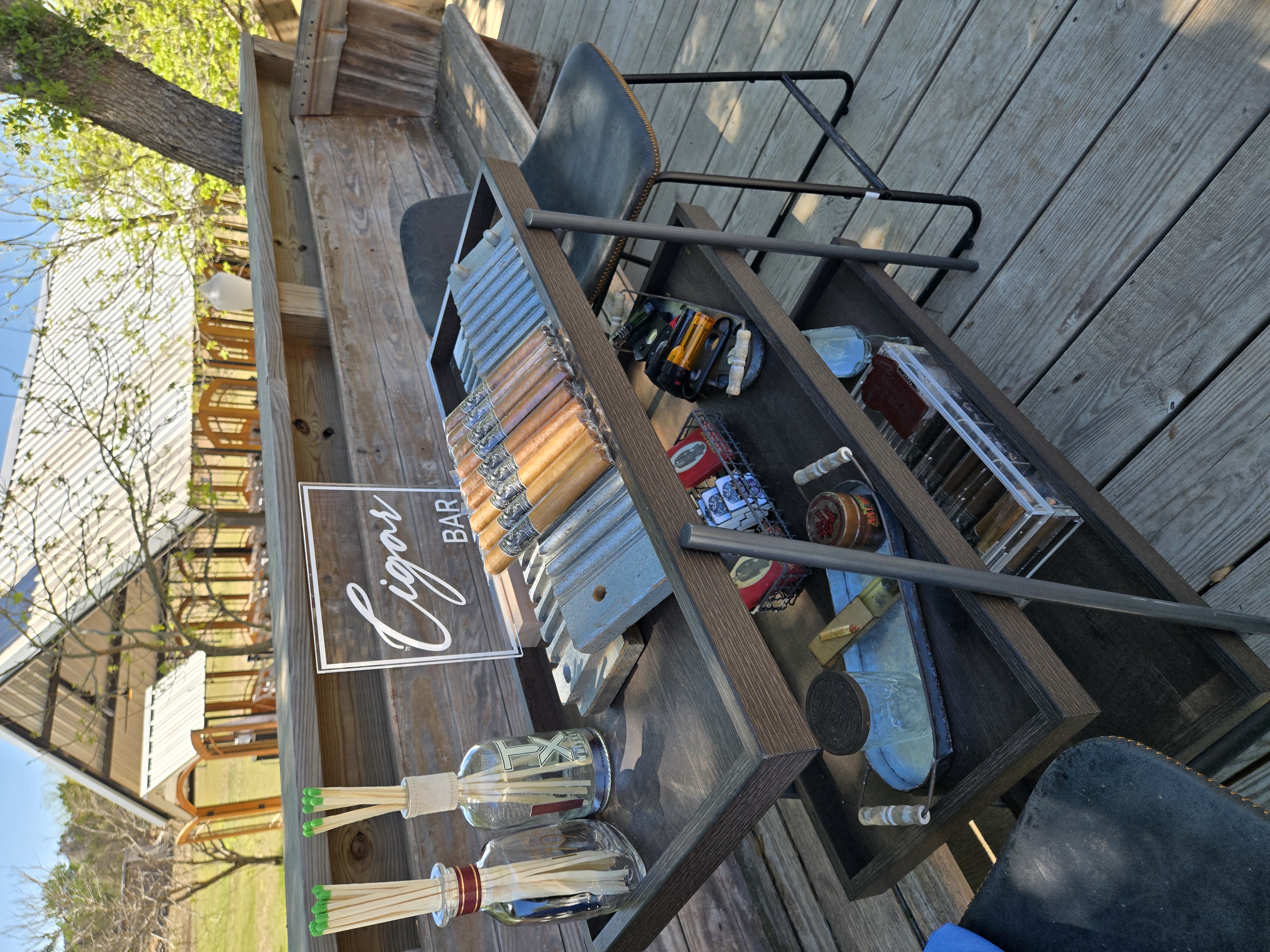 Outdoor cigar cart with Cigar Bar sign for The Rustic Reserve