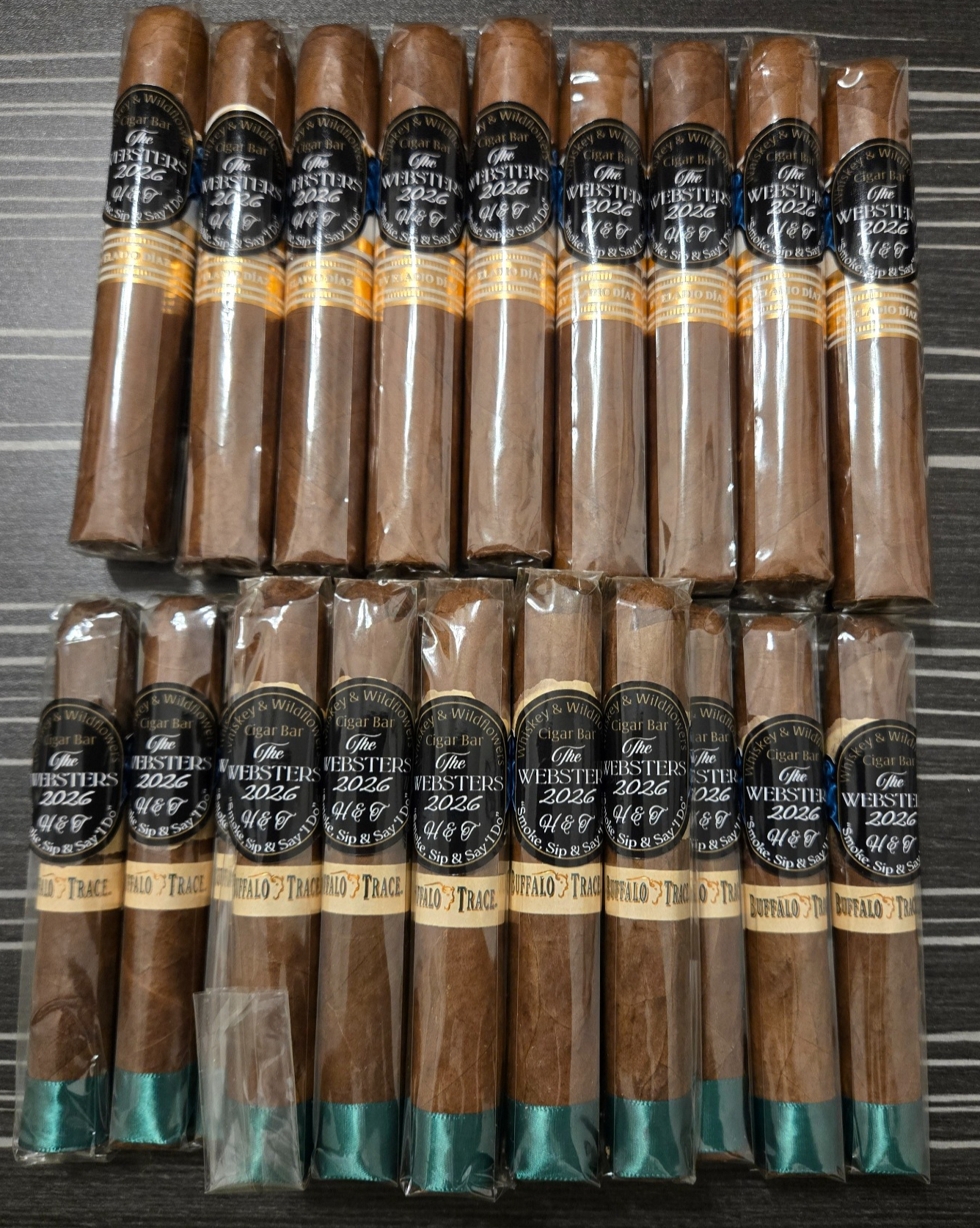 Individually wrapped cigars with custom wedding bands paired with Buffalo Trace bourbon