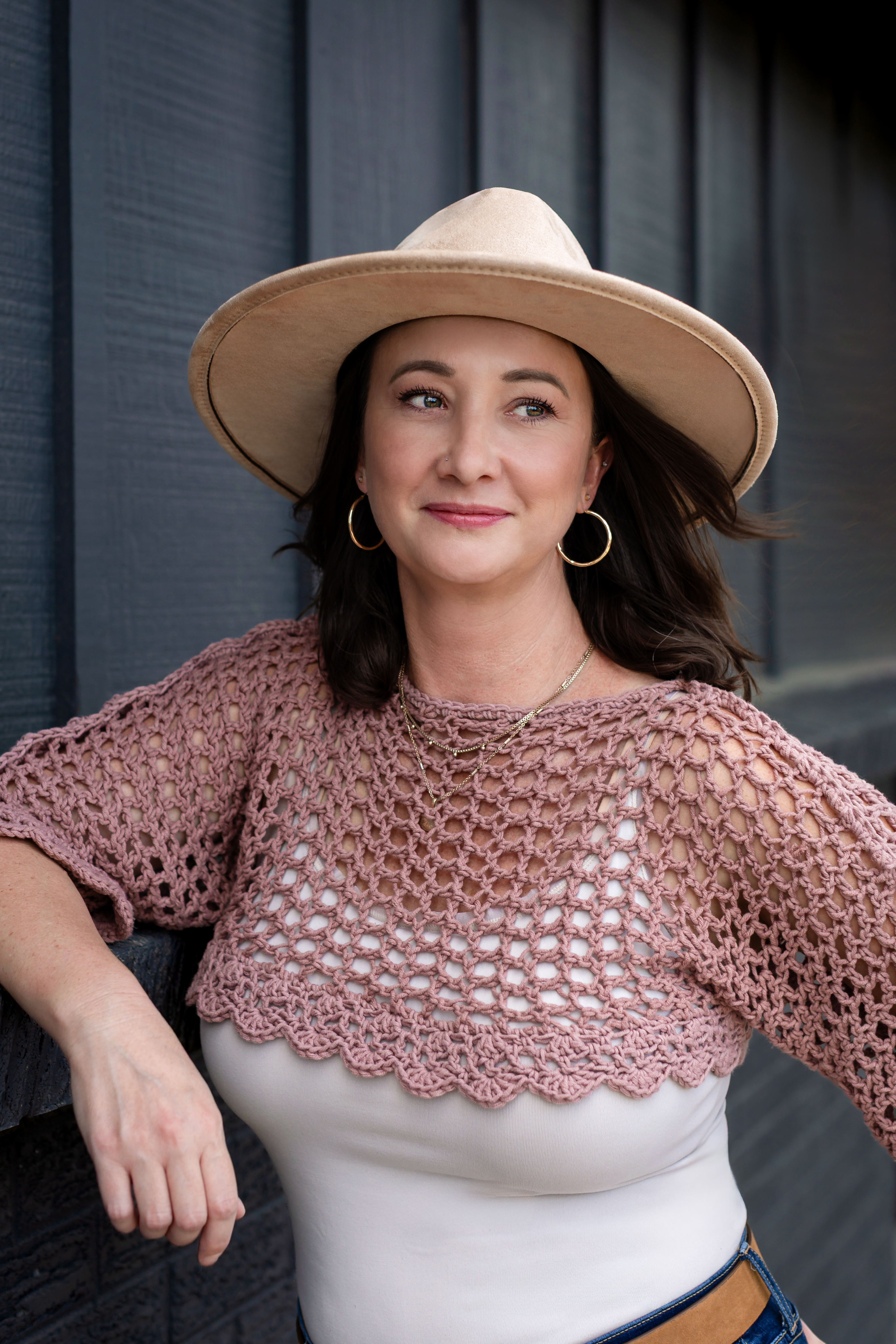 Jentrey Rey in her blush knit wrap and hat
