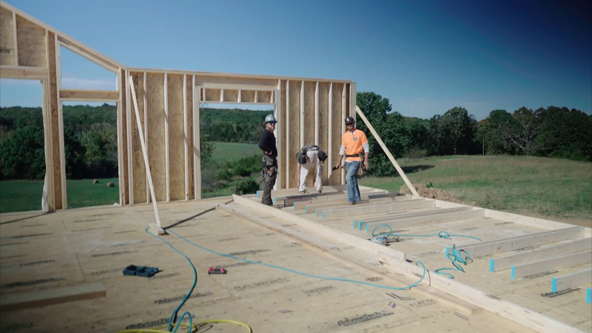 Aurora Carpentry crew checking a framed wall section for framing in Union, MO