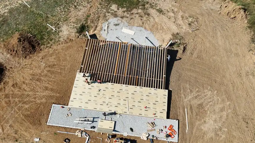 Drone aerial of a new home build on its foundation for custom home building in Union, MO