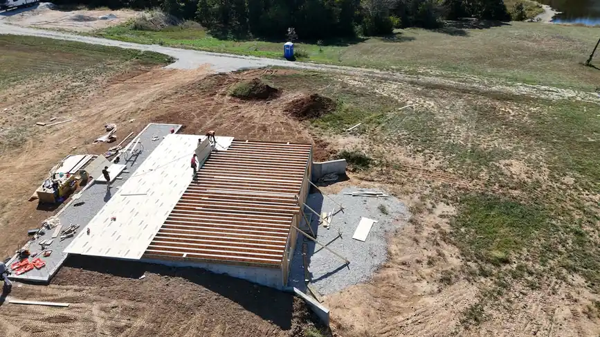 Drone aerial of a floor system framed over a foundation for building construction in Union, MO