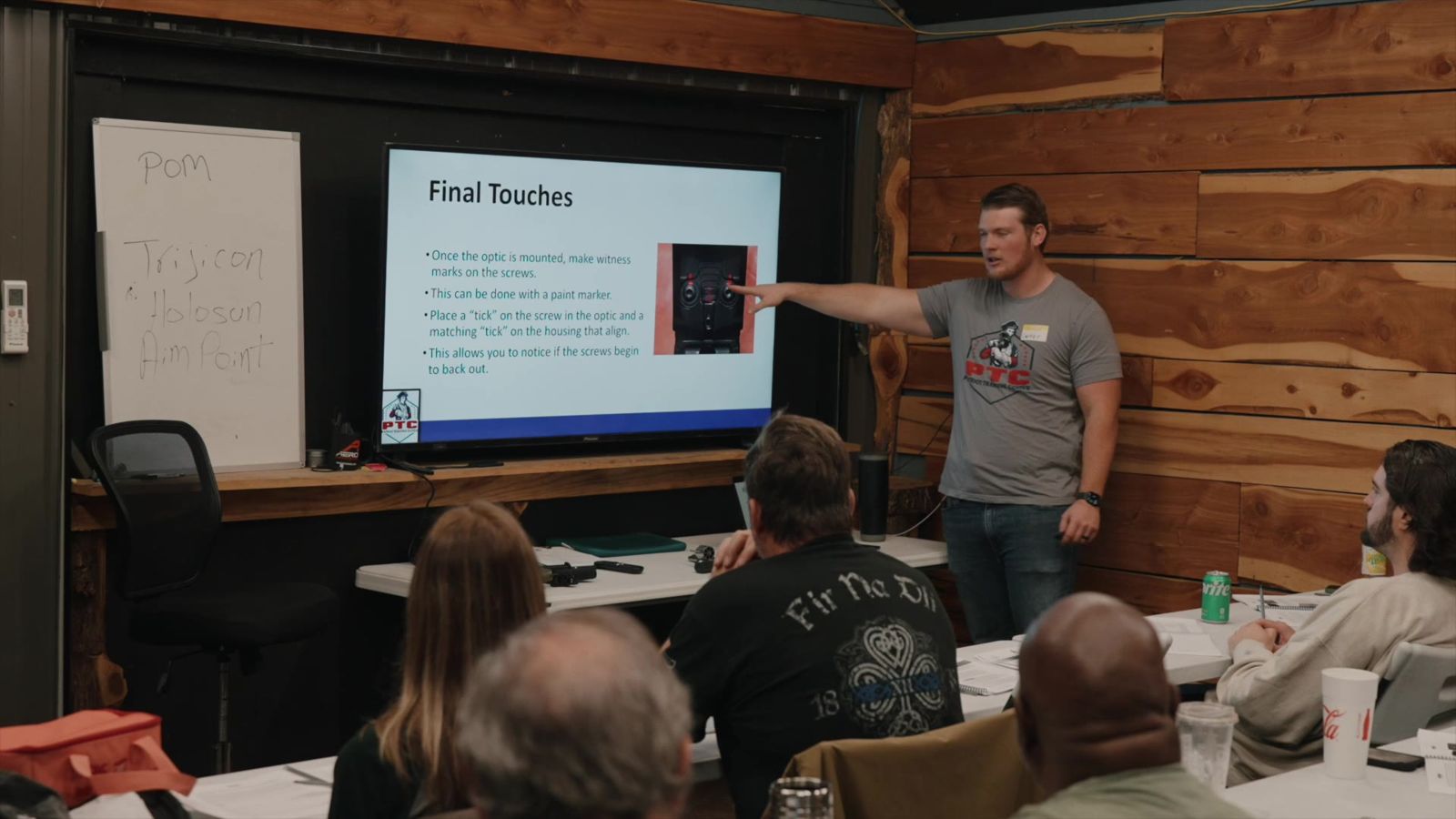 Carter, PTC head instructor, teaching a red dot class in our classroom