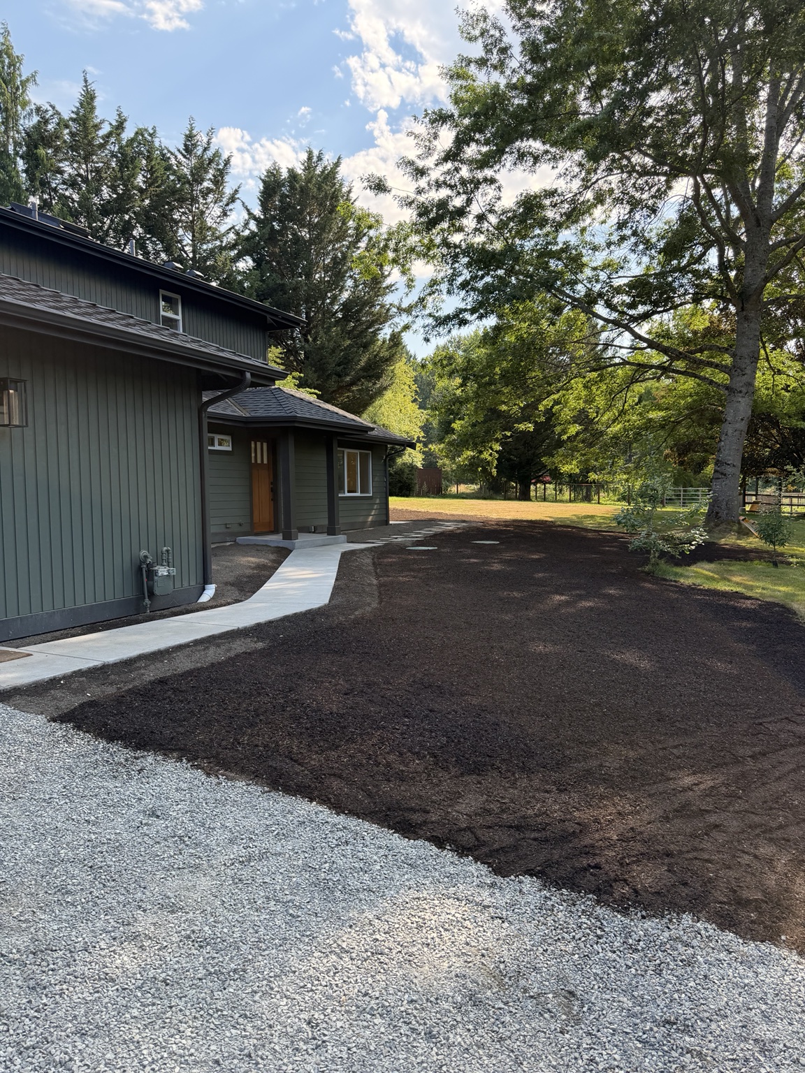 Yard grading and topsoil prep for a new walkway, East King County, WA