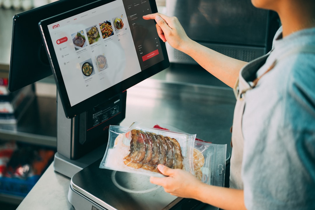 server processing order for promotion at restaurant