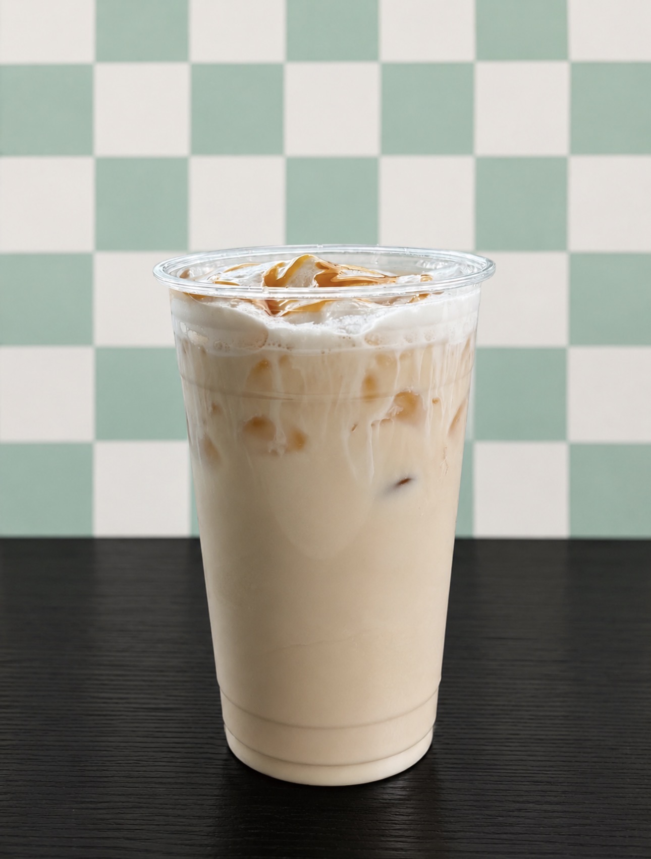 Iced specialty drink with a creamy topping