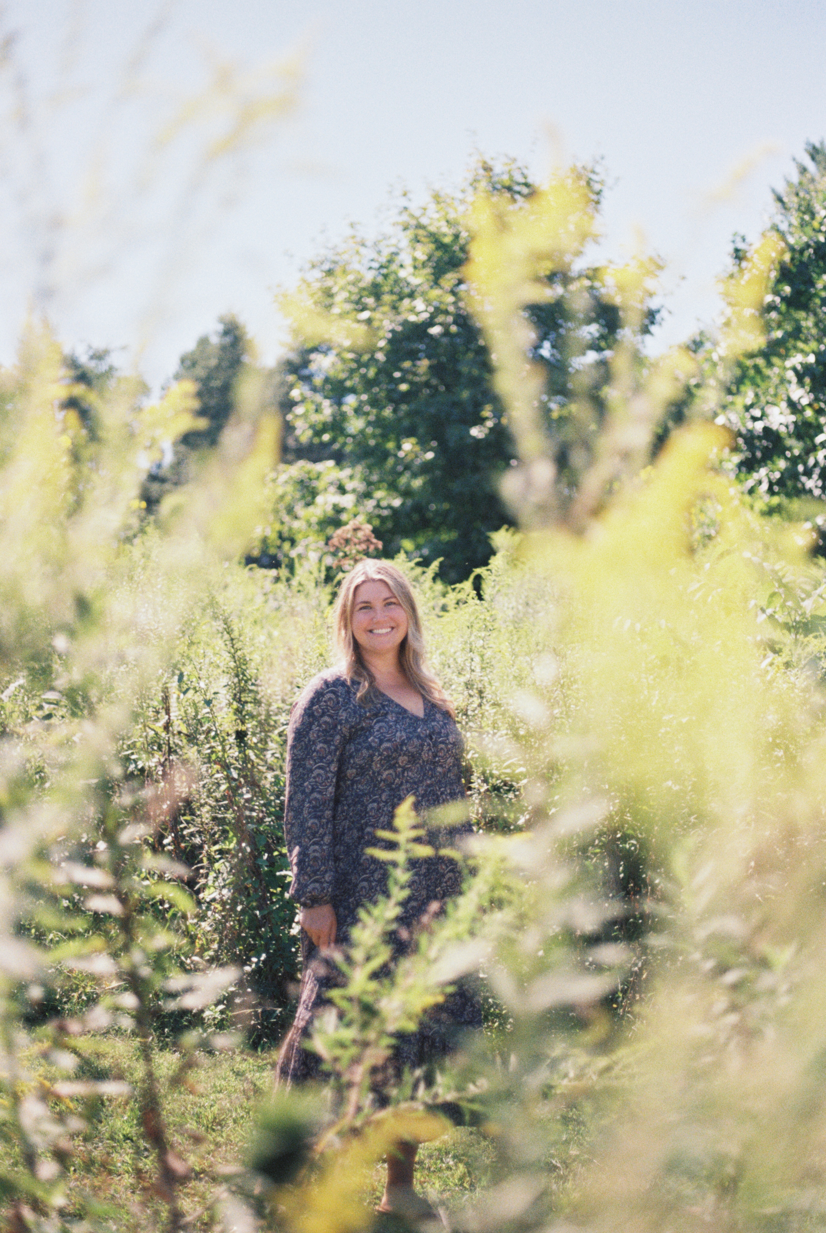 Nicole Doyle in a wildflower field