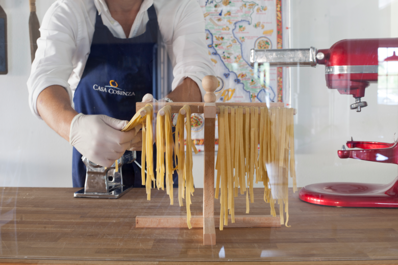 Chef rolling fresh pasta in the Casa Cosenza kitchen in Oldsmar