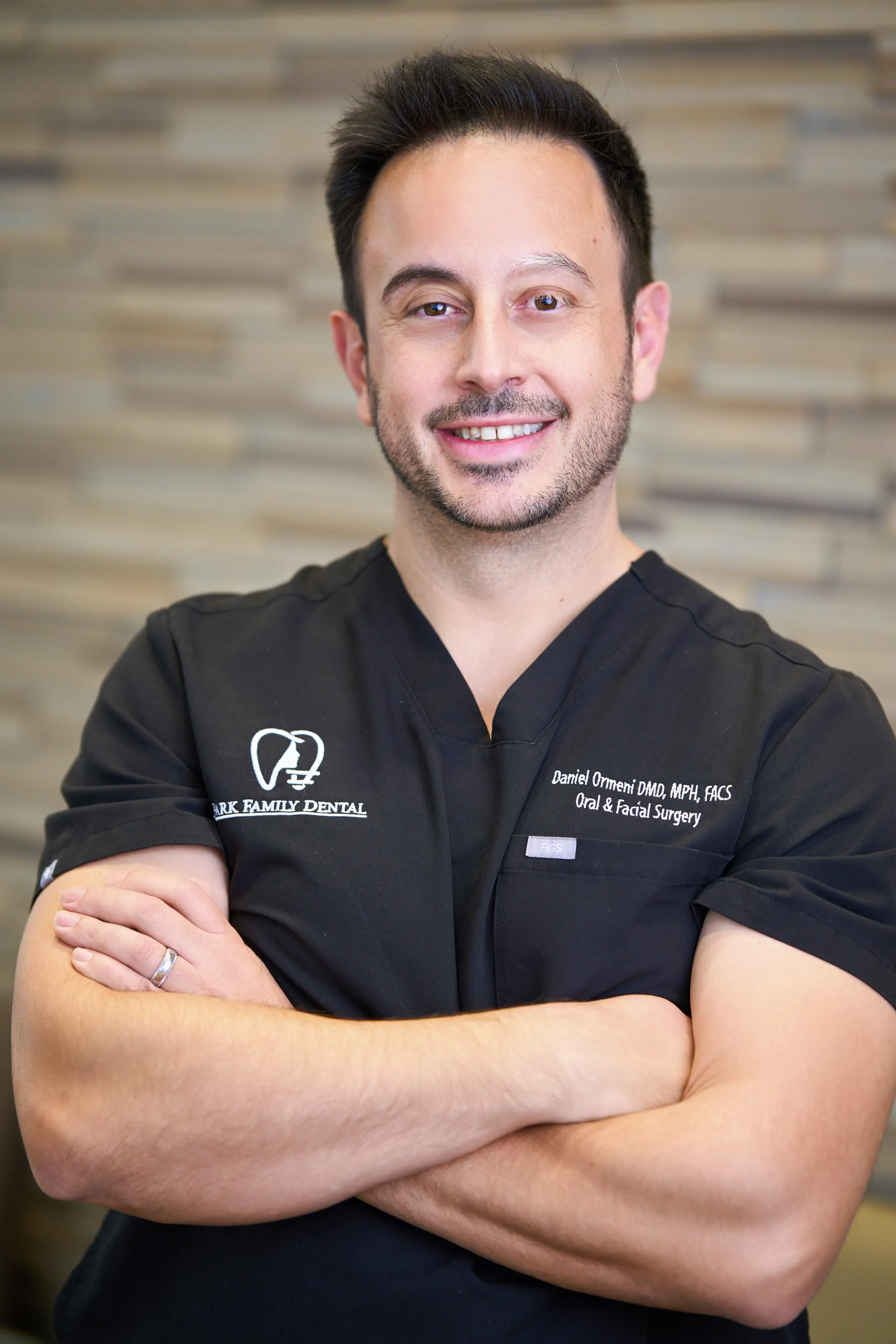 Dr. Daniel Ormeni, board-certified oral and maxillofacial surgeon performing wisdom tooth removal in Cedar Park, TX