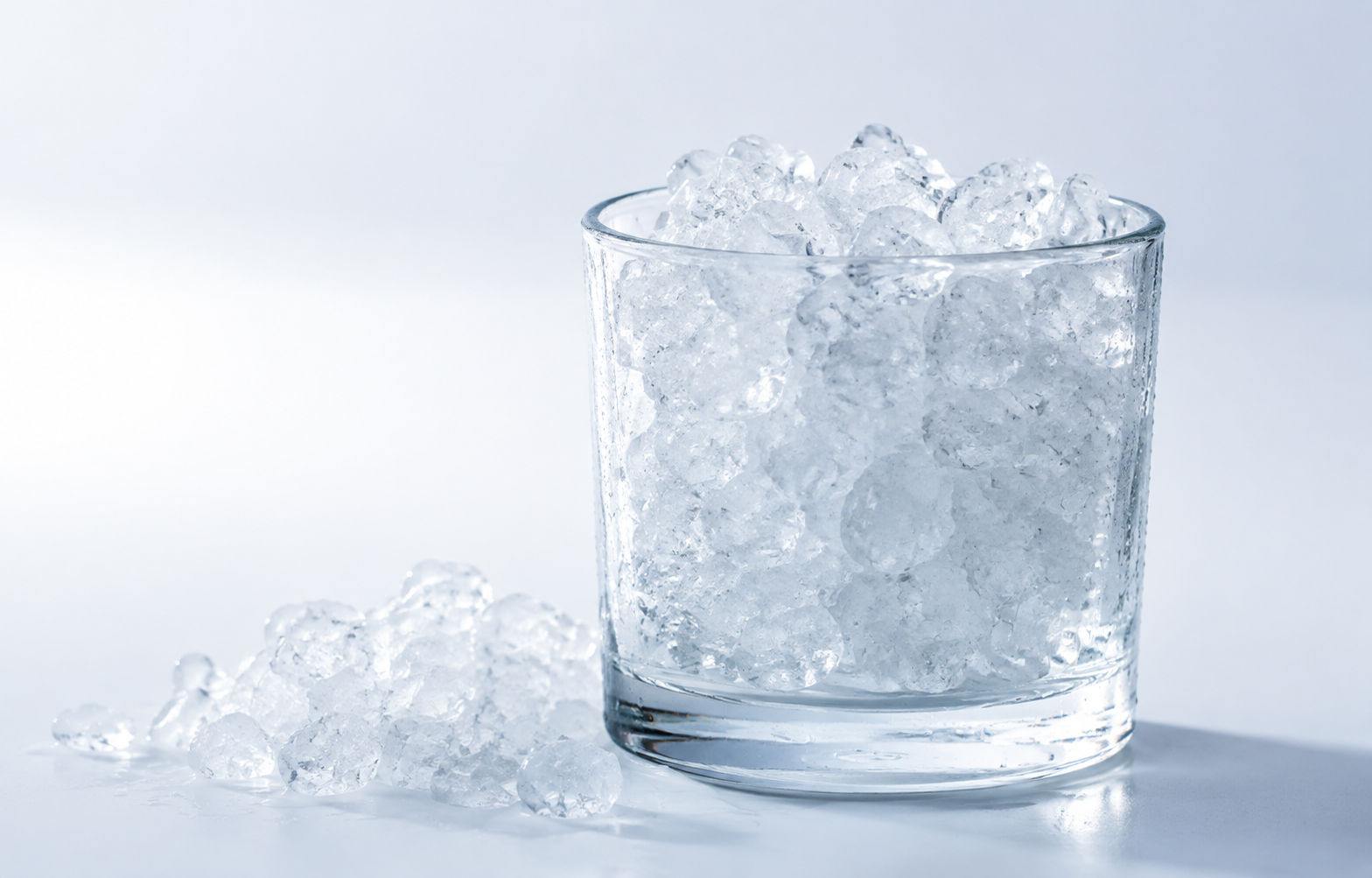 Close-up of soft translucent nugget ice in a clear glass