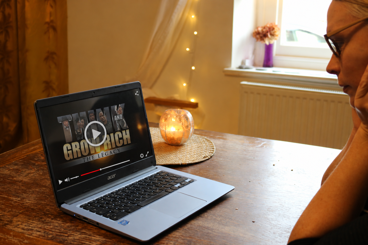 Think and Grow Rich playing on a laptop