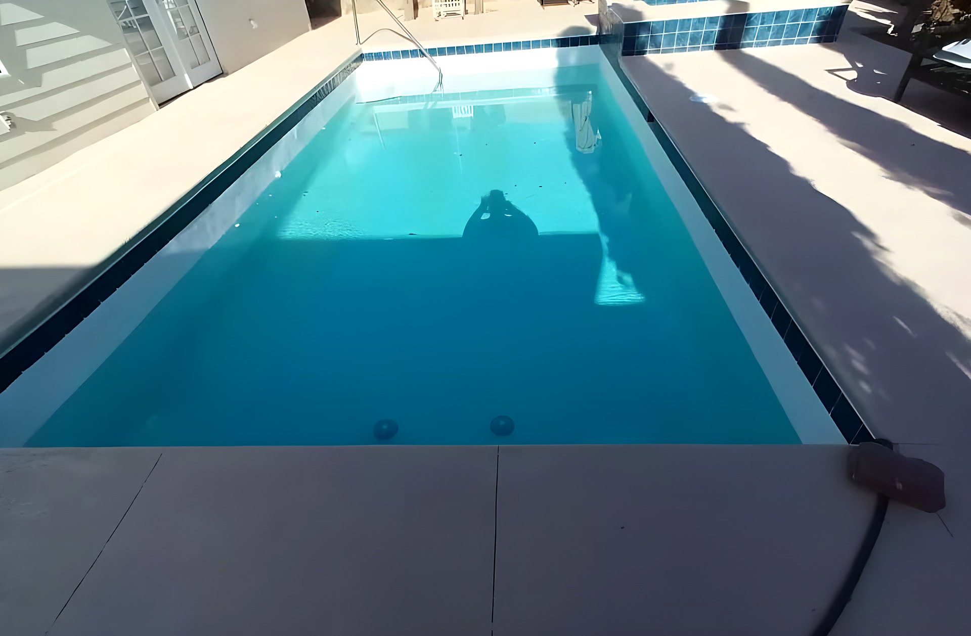 Clean rectangular pool maintained by Clearview in El Paso