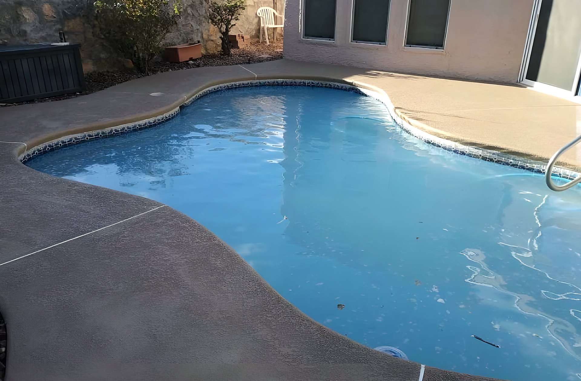 Freeform pool in an El Paso desert backyard