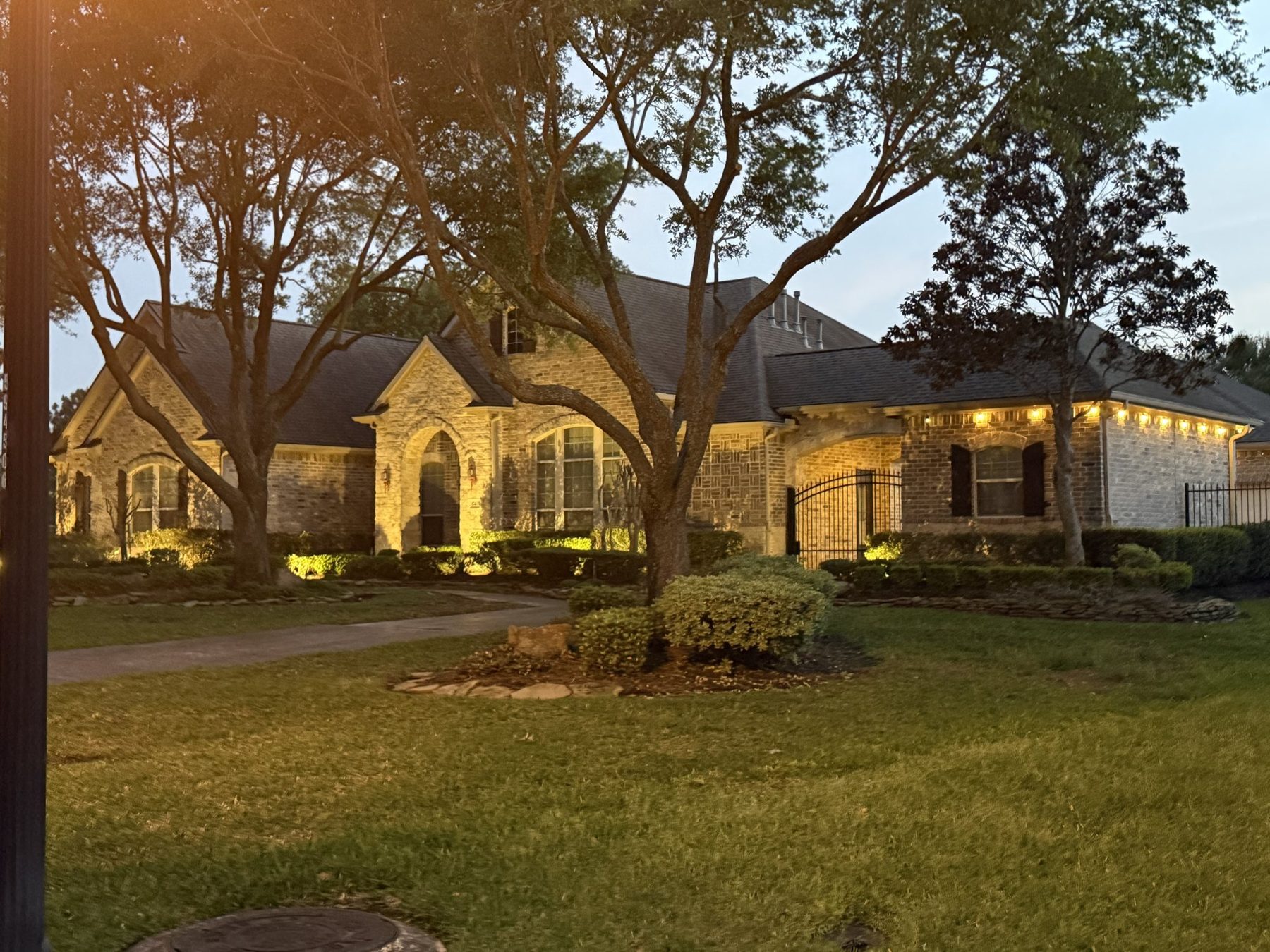 A finished roof on a Houston home at dusk