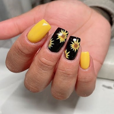 Custom nail design by Beauty Essence Spa