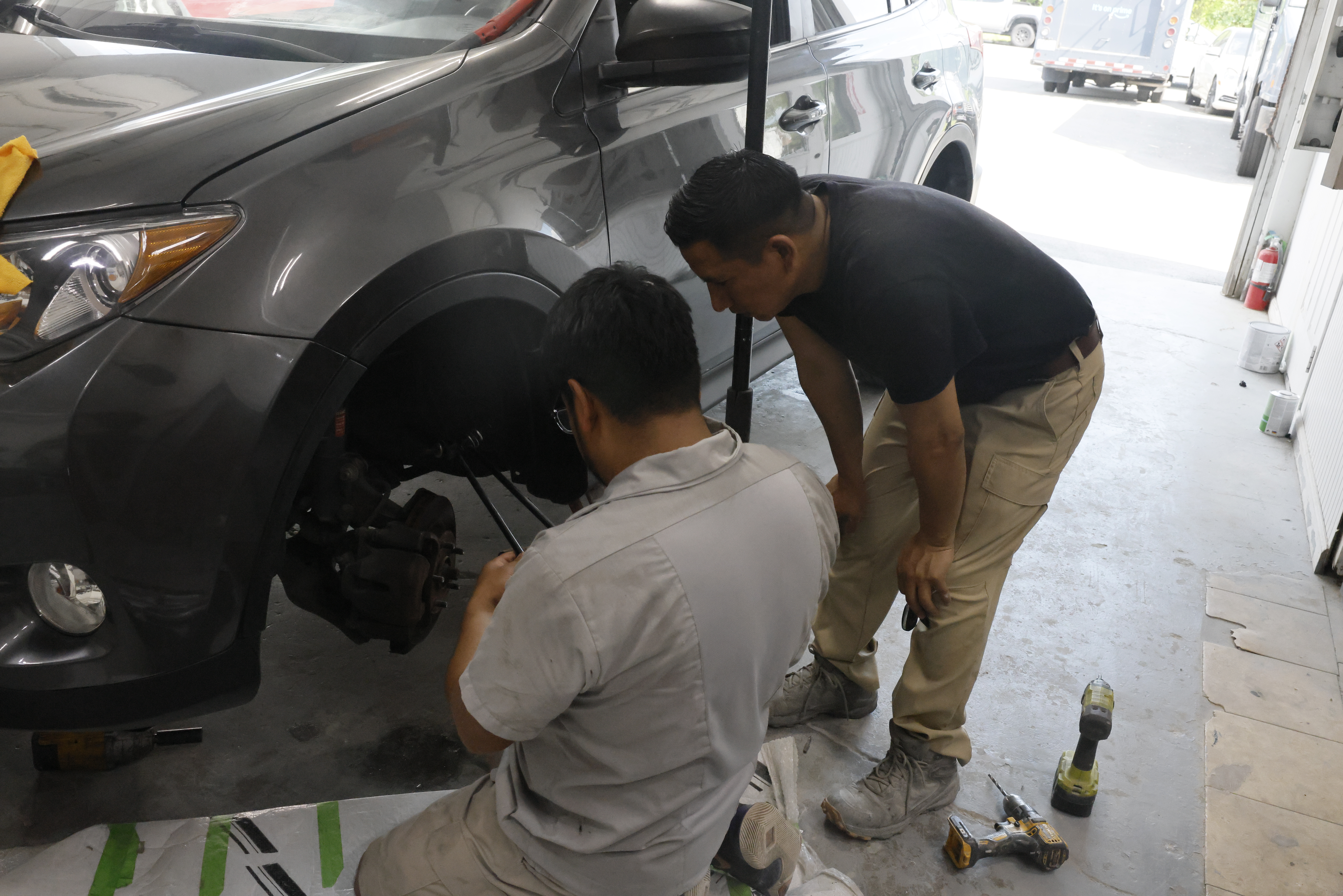 Houses Autobody team at the shop