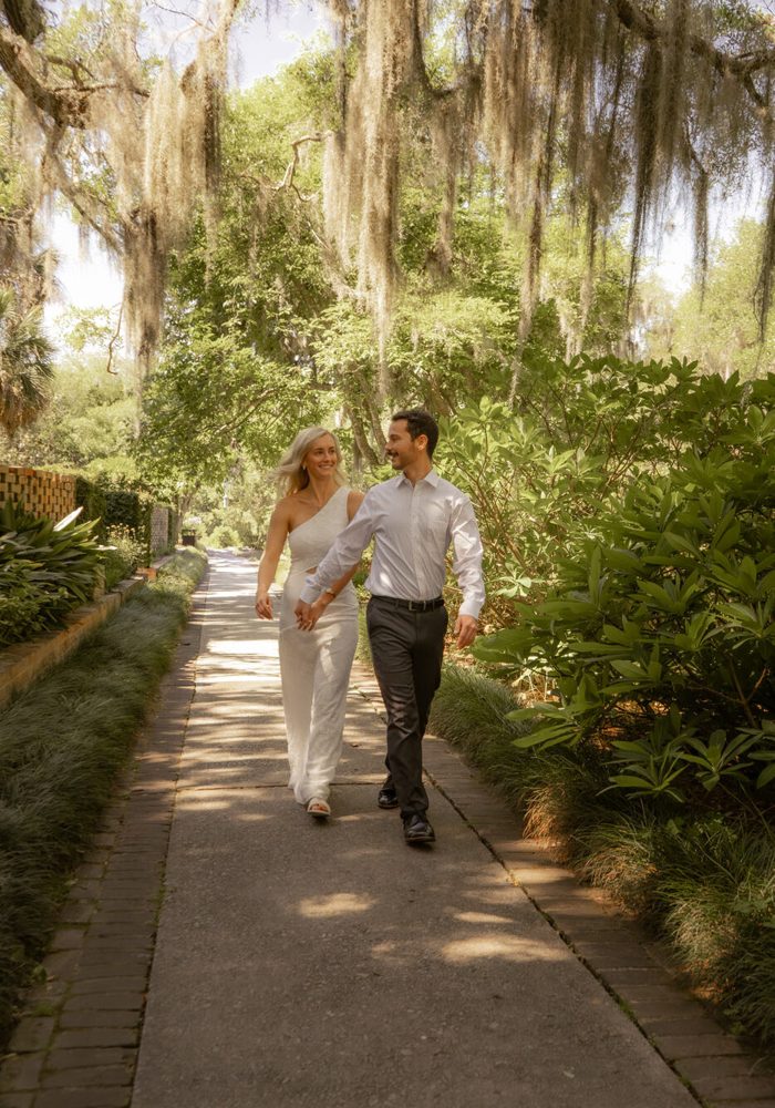 Couple walking a garden path