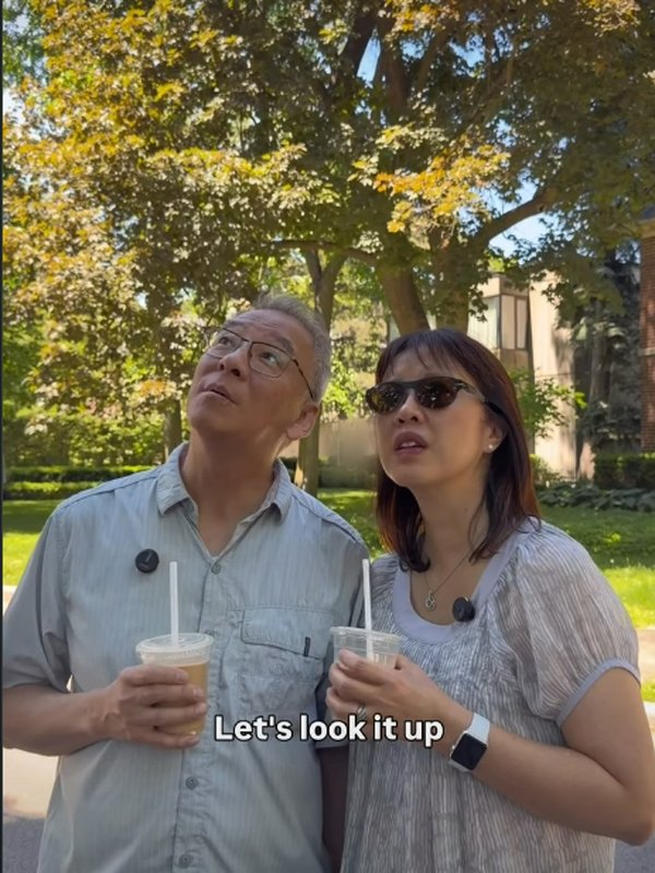 Winnie and John walking a Markham street