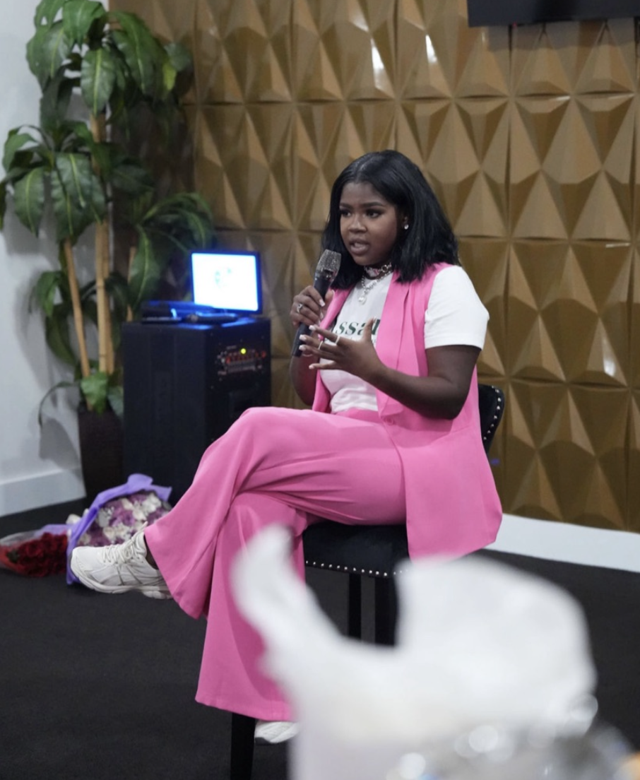 Assata Thomas speaking at a live session