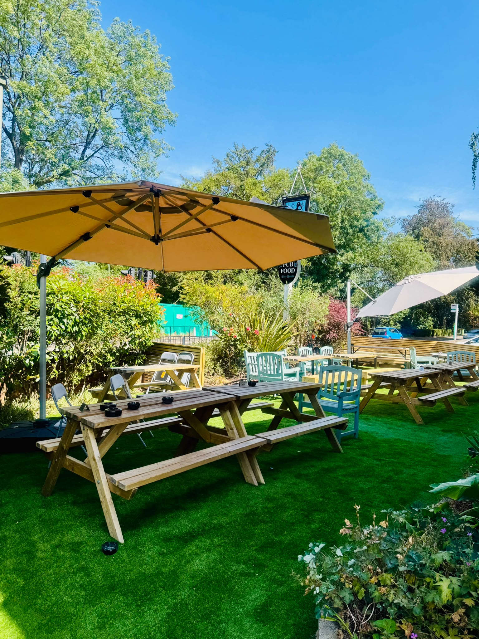 The Anchor Bookham beer garden with parasols and picnic benches