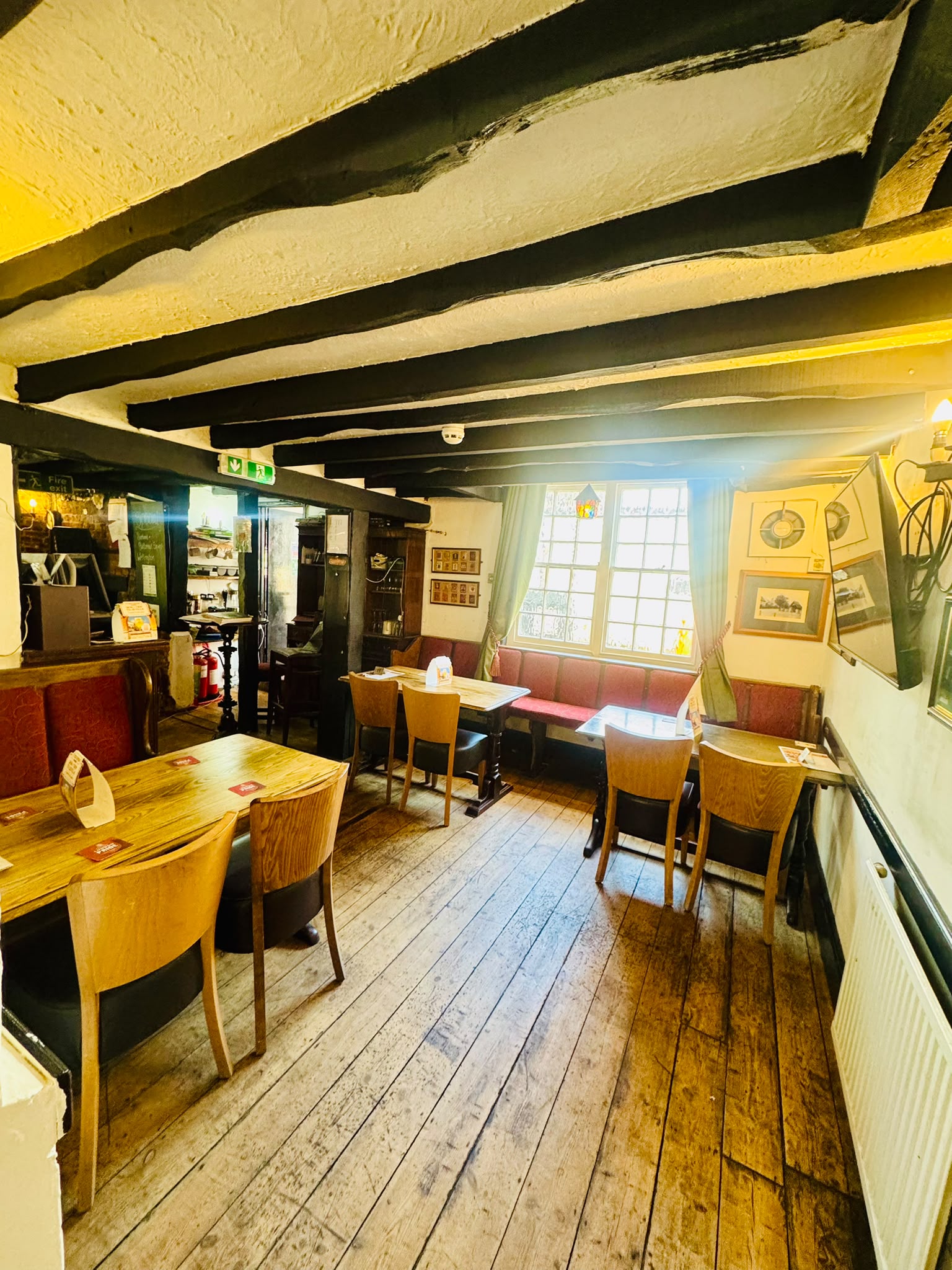 The warm and inviting interior of The Anchor Bookham, a 17th century Surrey pub
