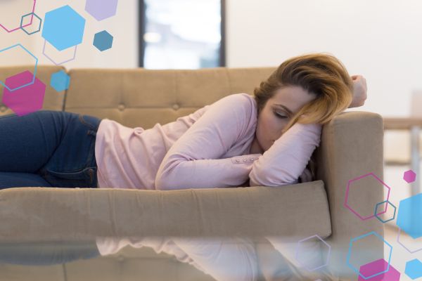 Person lying down asleep during the day, showing overwhelming fatigue in early pregnancy.