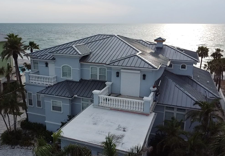 Gulf Blvd FL Coastal home with gaf standing seam metal roof installed by Team Armored