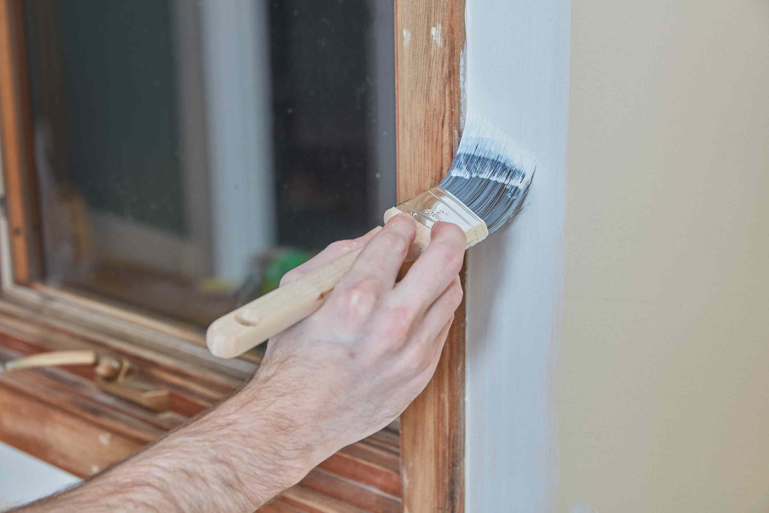 Brush work at a window frame