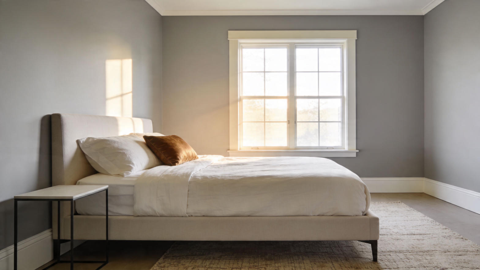 Bedroom with smooth gray walls