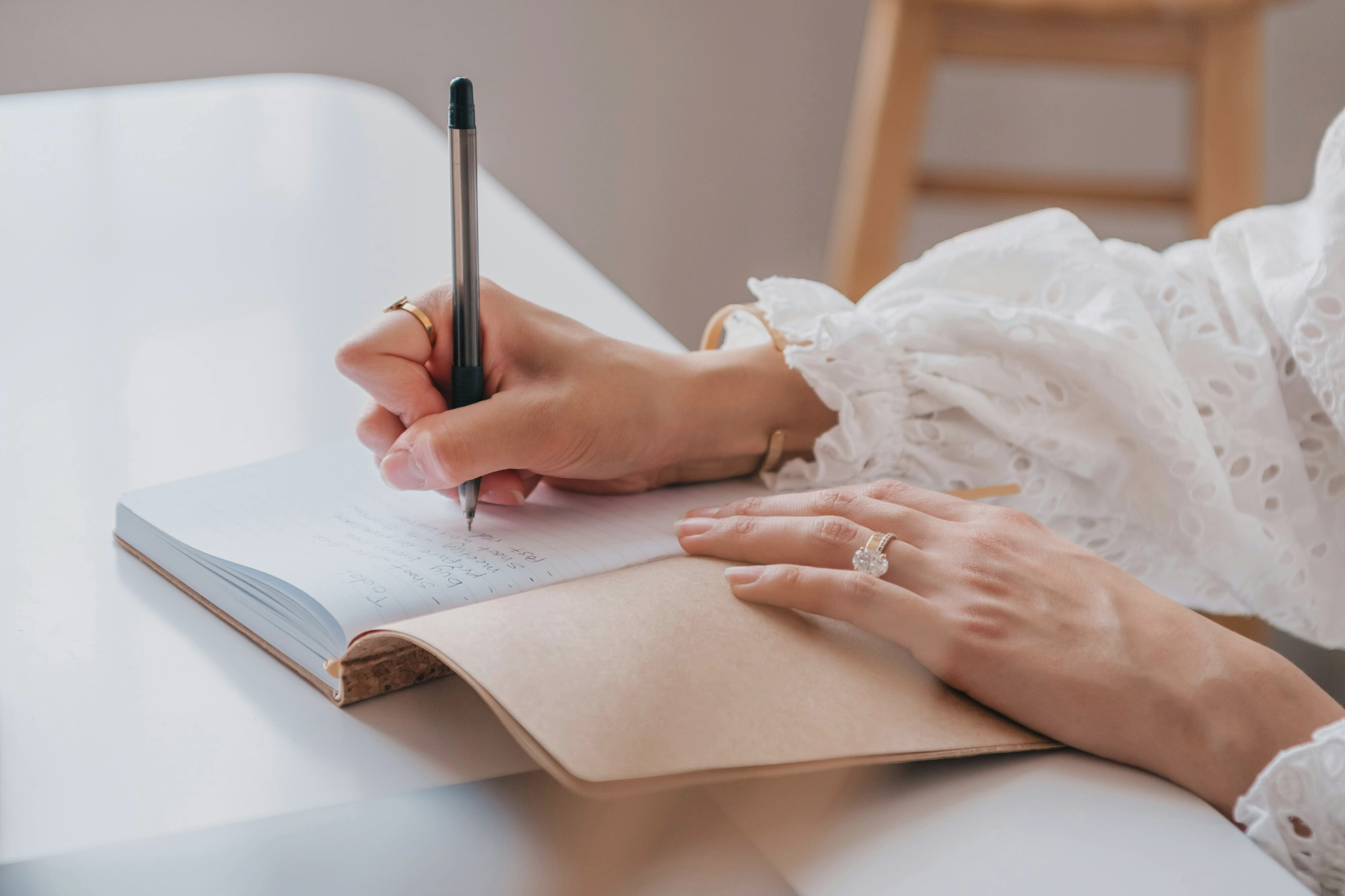 Woman writing in a notebook