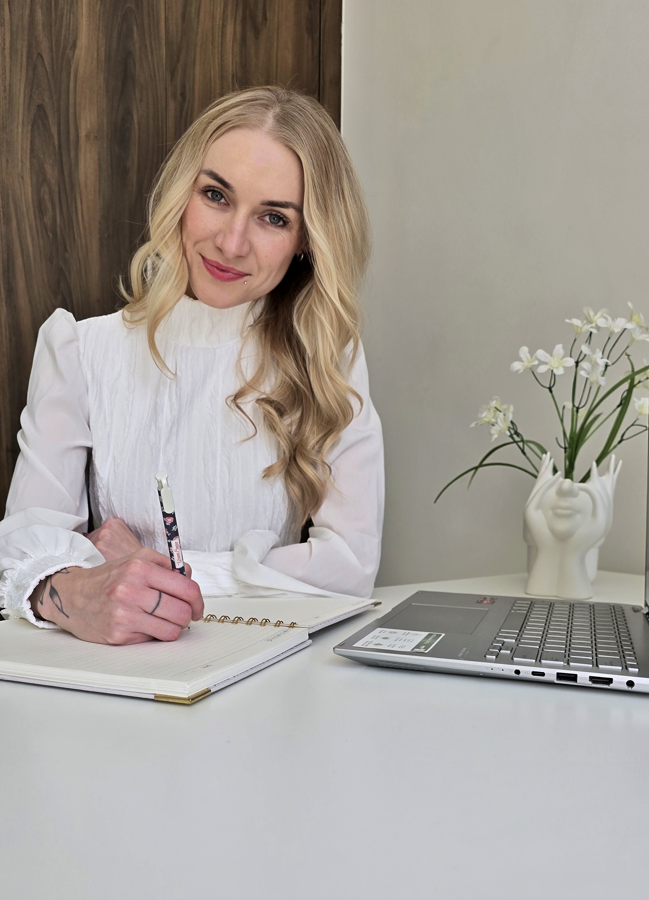 Jolene working at her desk