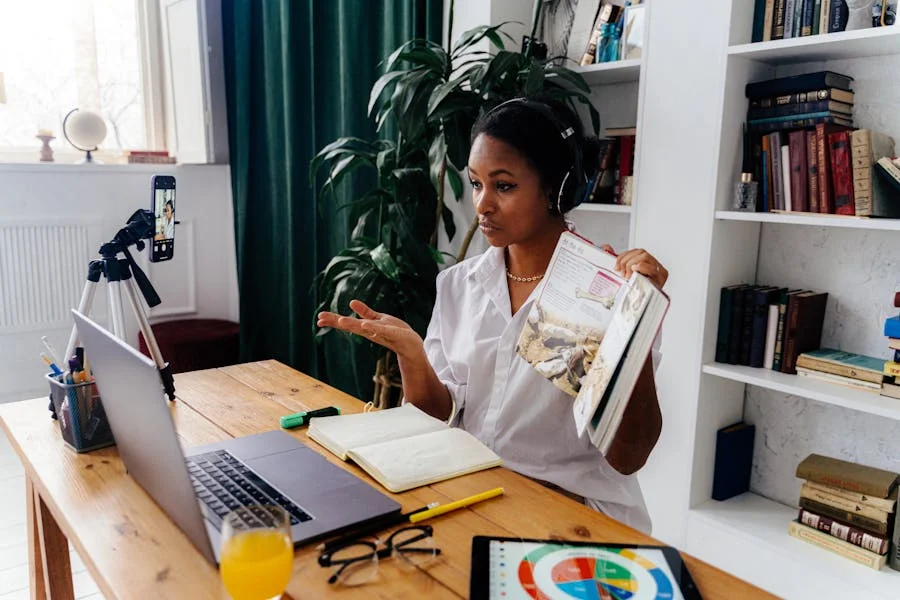 Online tutor preparing a virtual lesson with laptop