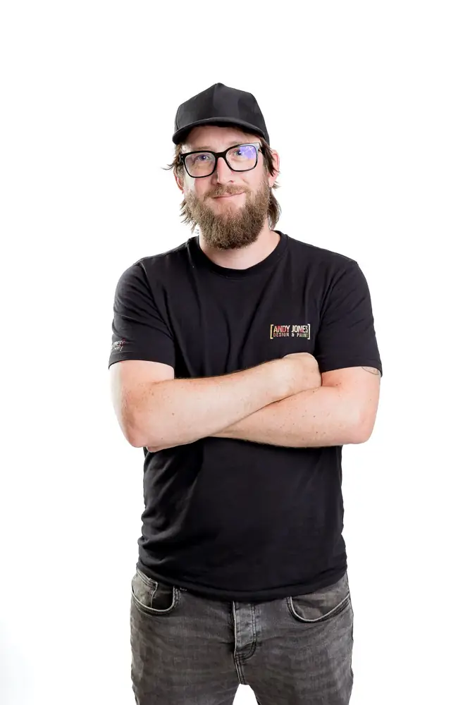 Andy Jones, designer and printer, in his branded T-shirt