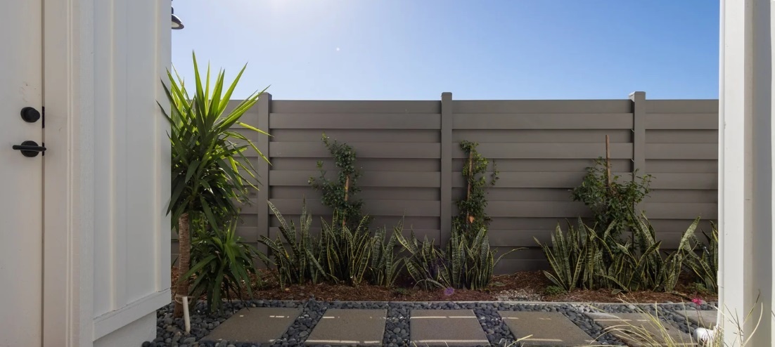 MWF Solutions non-combustible galvanized steel privacy fence available from Islas Fencing