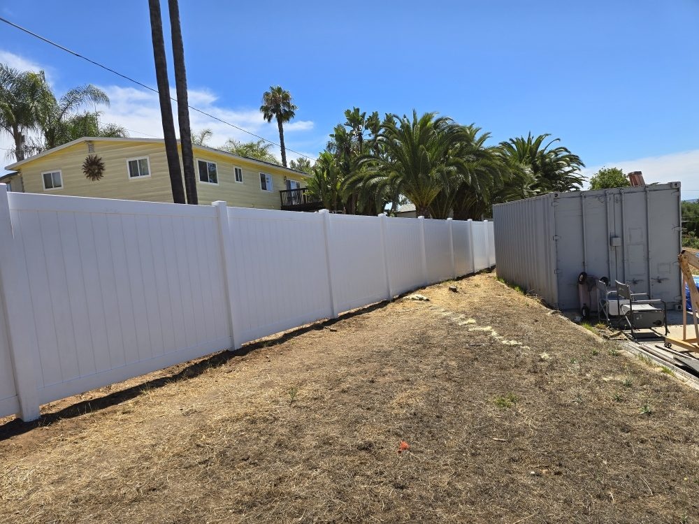 Vinyl privacy fence and gate project by Islas Fencing
