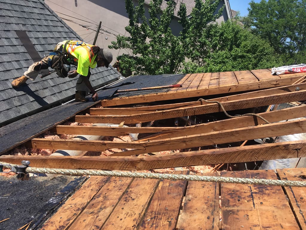 Roofing crew installing shingles in Toronto