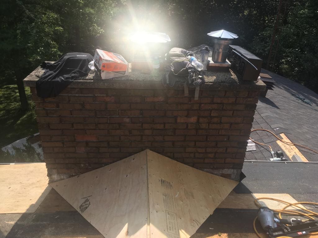 Flat roof membrane being repaired on a residential building in Toronto