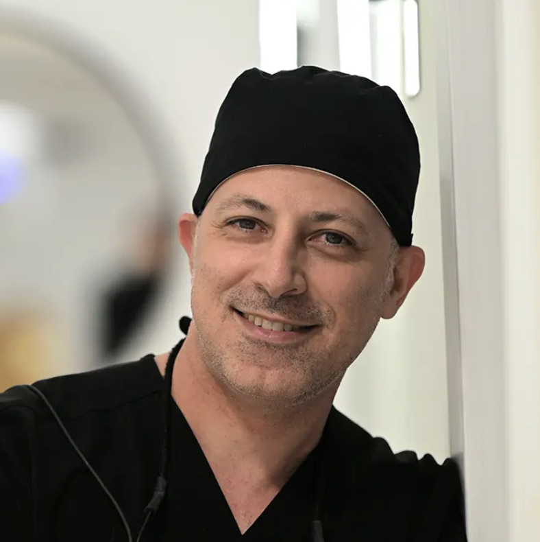 Dr. Saeid Abbasiyan with a happy patient